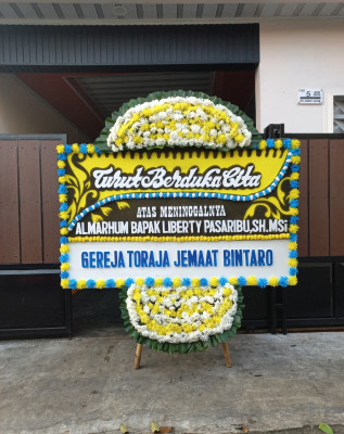 Papan Bunga Duka di Tirtomartani